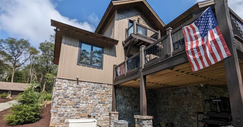 Pennsylvania residential home showing a Generac whole-home backup generator installed by Kinsmen Electric electricians.