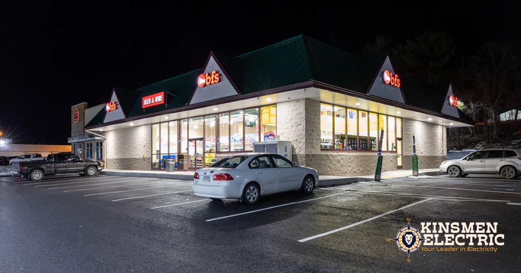 Night view of BFS Somerset convenience store with illuminated interior and exterior lighting, part of Kinsmen Electric’s new construction commercial electrical work.